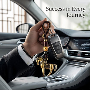 Solid brass horse keychain attached to car keys, symbol of success and momentum