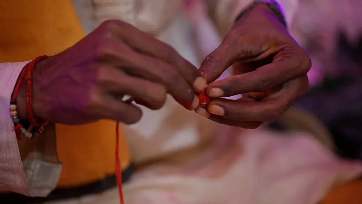 Why the Red Ribbon Bracelet Tradition Continues Today