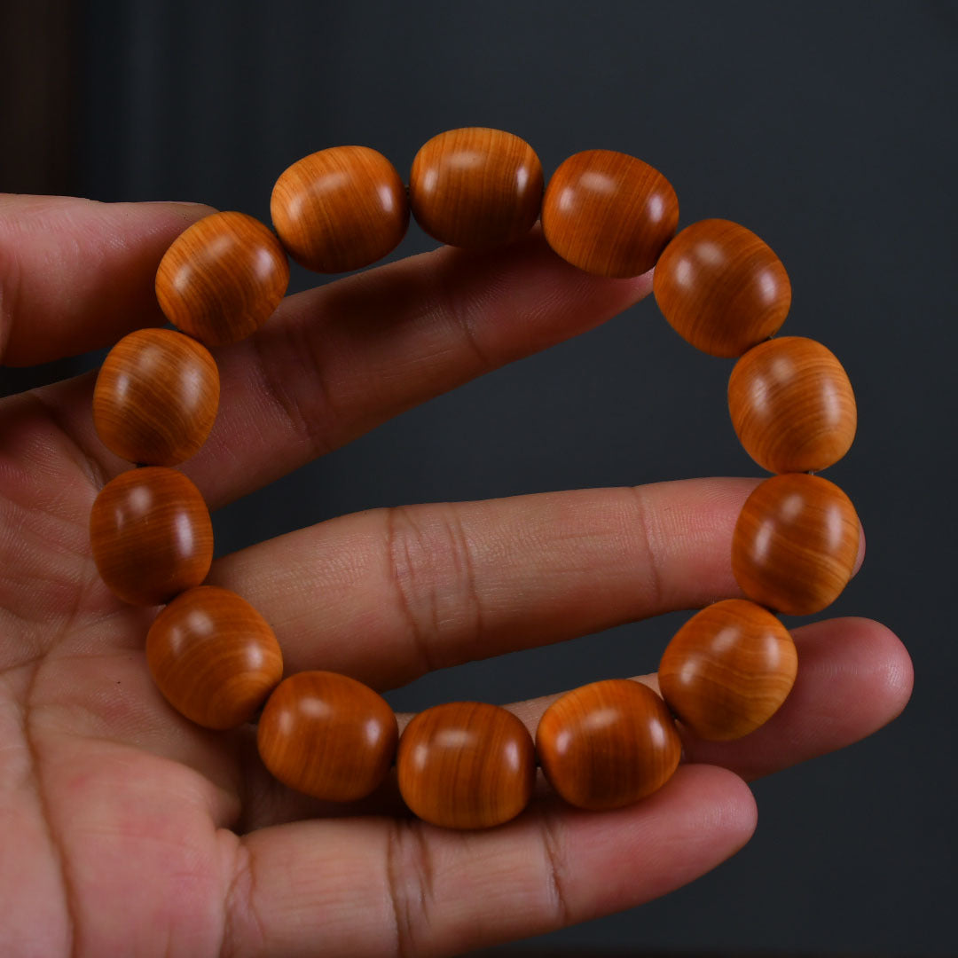 Date-Shaped Bead Yellow Oil Cliff Cypress Bracelet