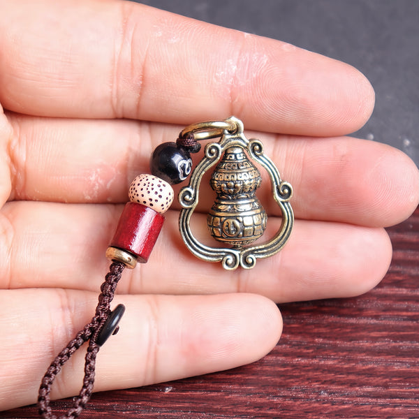 Rotating Brass Hulu Keychain for Peace, Protection & Turning Luck