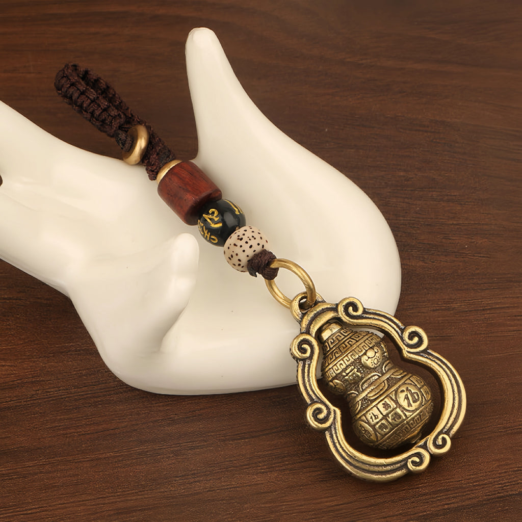 Rotating Brass Hulu Keychain for Peace, Protection & Turning Luck