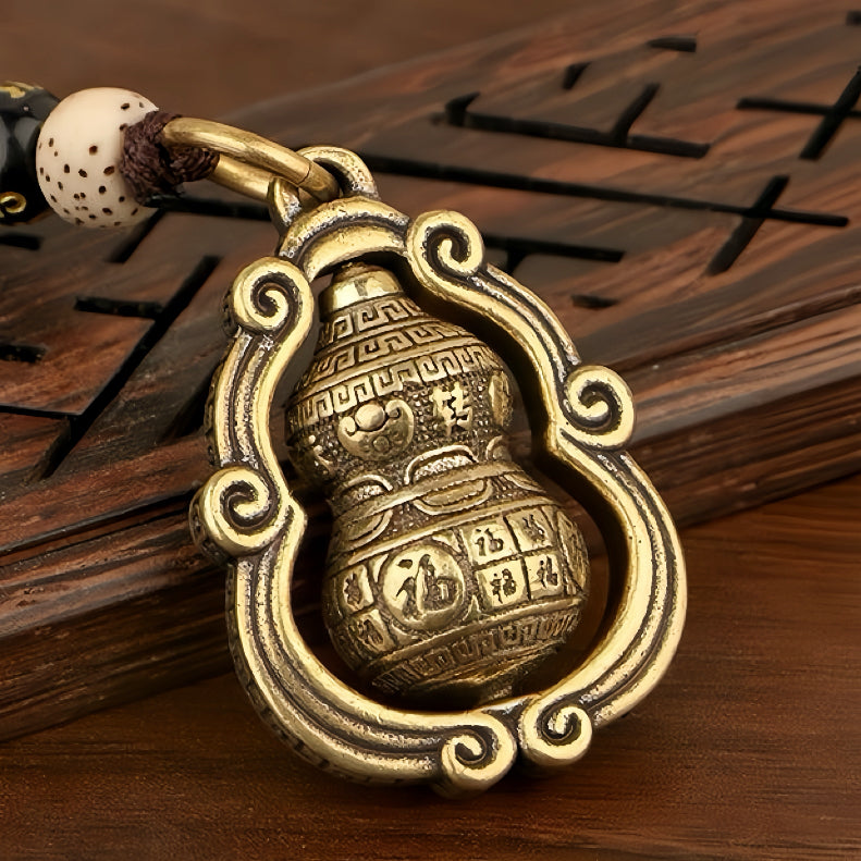 Rotating Brass Hulu Keychain for Peace, Protection & Turning Luck