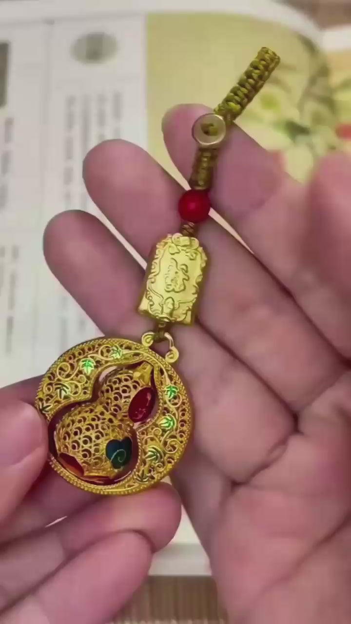 Peace & Protection Rotating Hulu Keychain